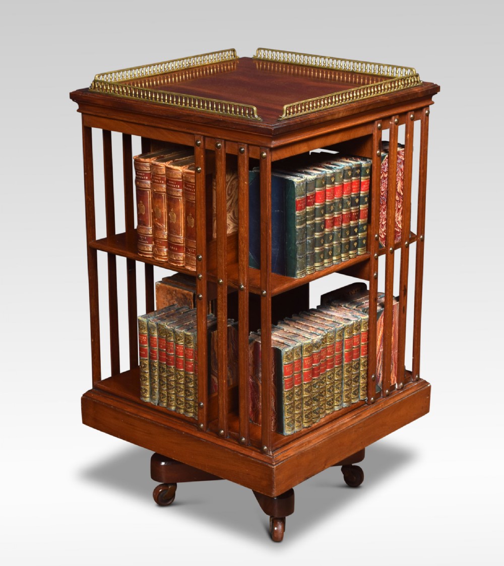 Mahogany revolving bookcase by Maple and Co