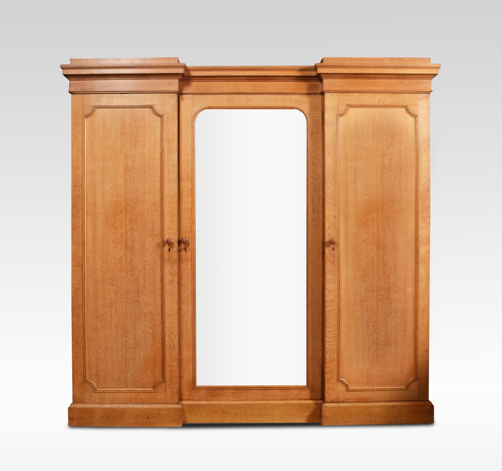19th Century limed oak triple wardrobe compactum