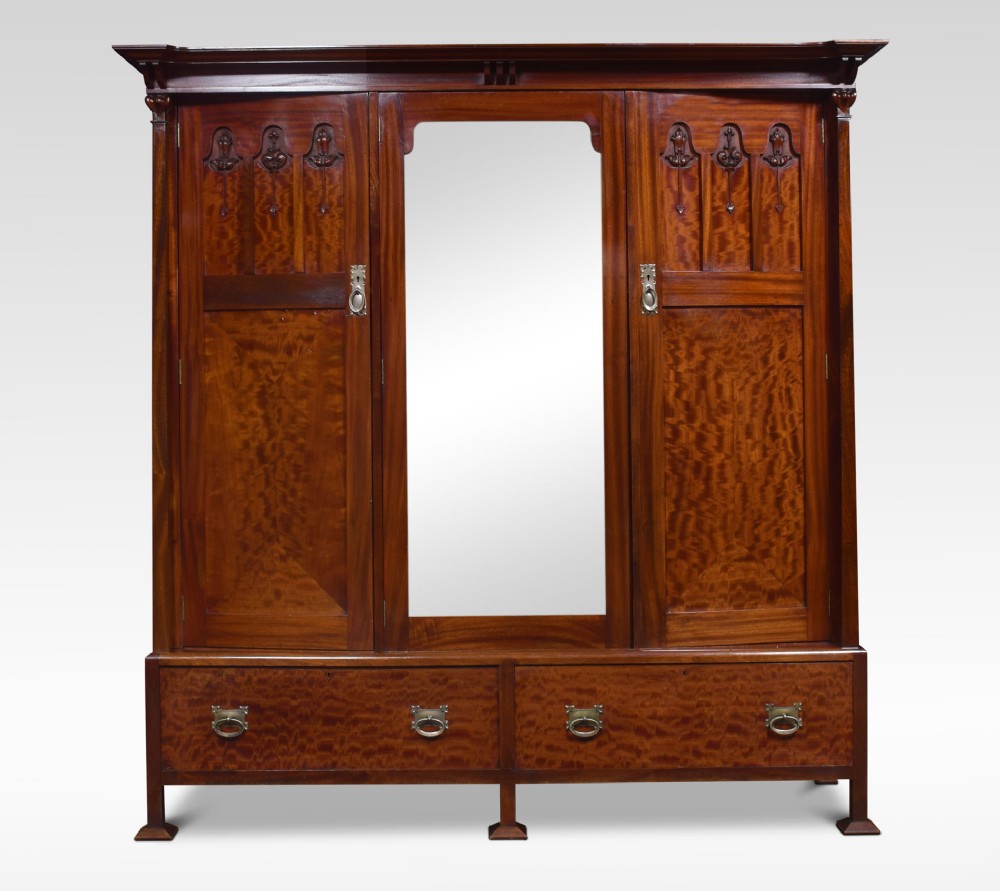 Arts and Crafts mahogany three door wardrobe