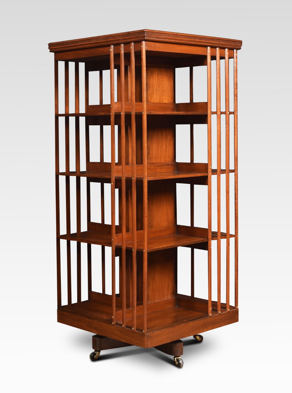 Large walnut revolving bookcase