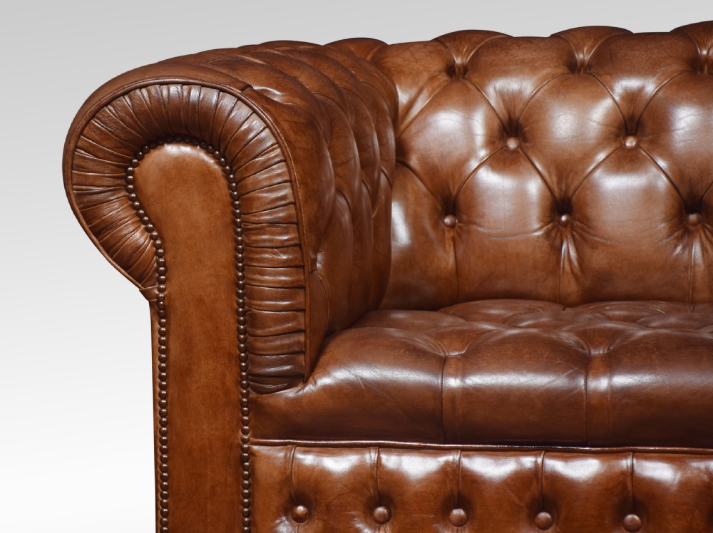 Pair of brown leather chesterfields View VI