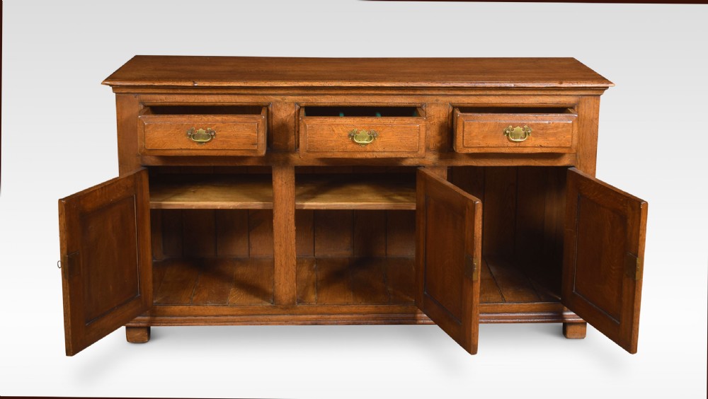 Three drawer oak dresser base View IV