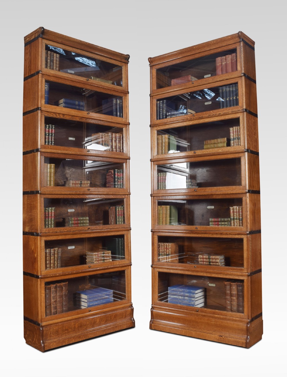 Large pair of oak globe wernicke seven section bookcases