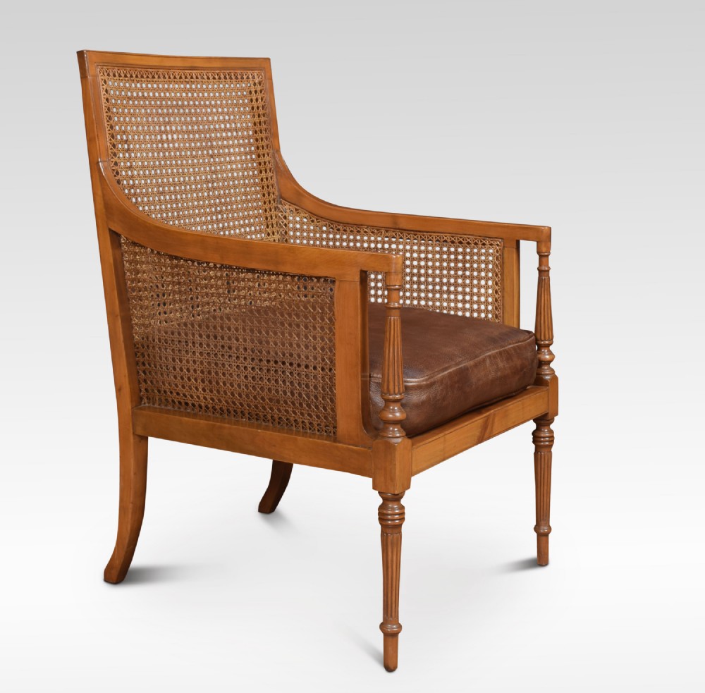 Satinwood bergere armchair