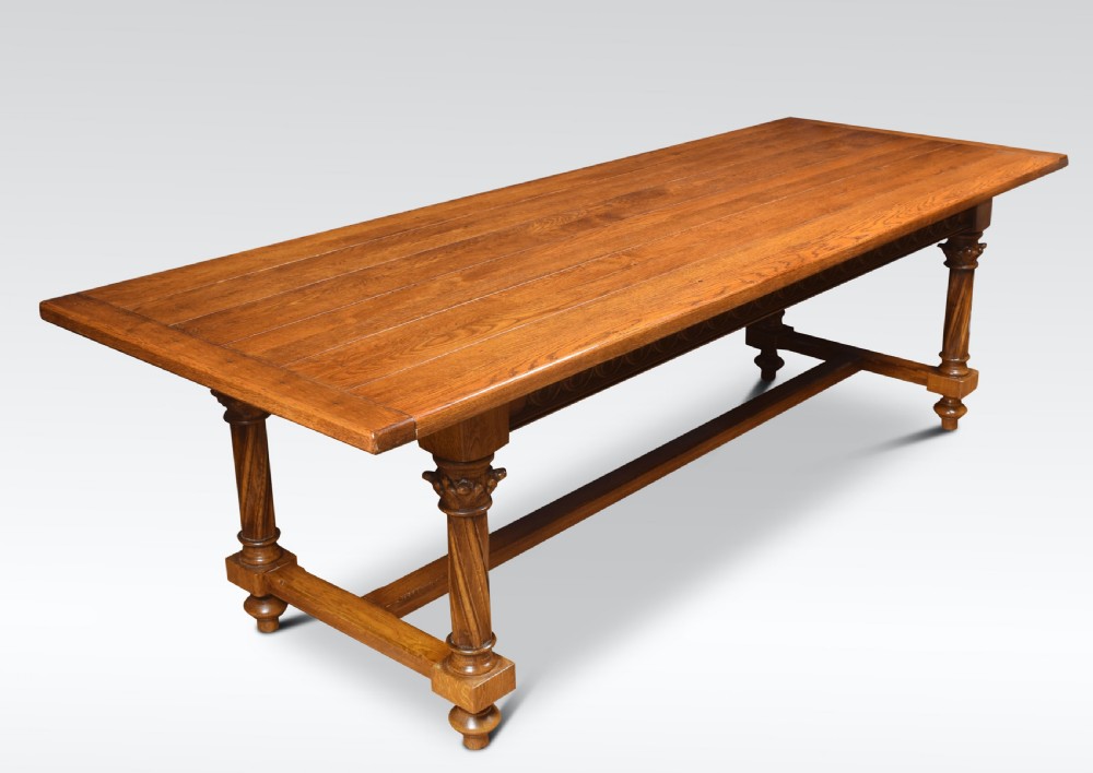 Gothic design oak refectory table and eight chairs View III