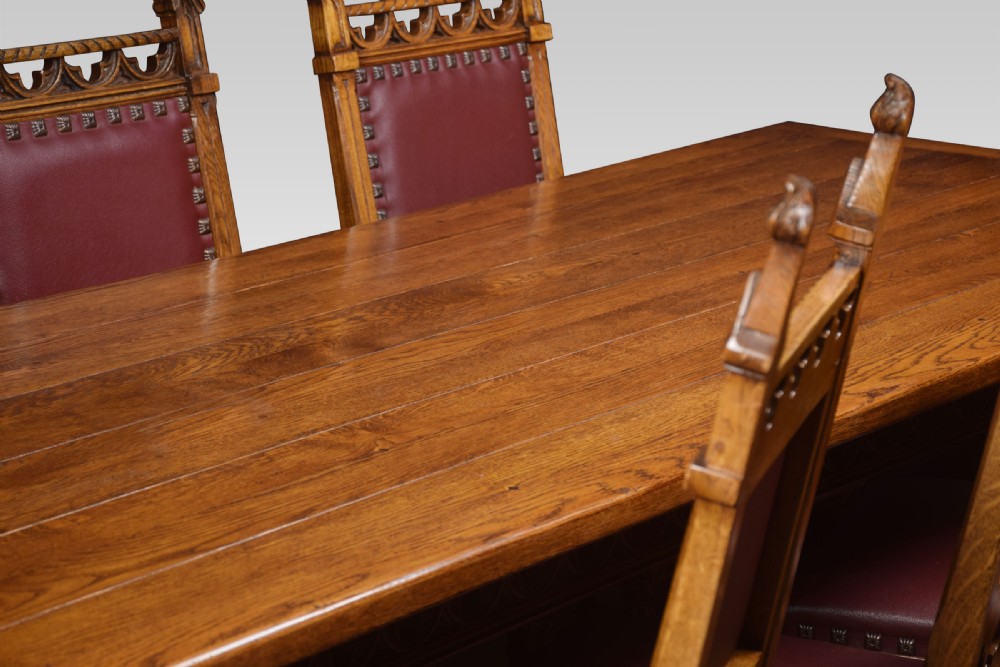 Gothic design oak refectory table and eight chairs View VI