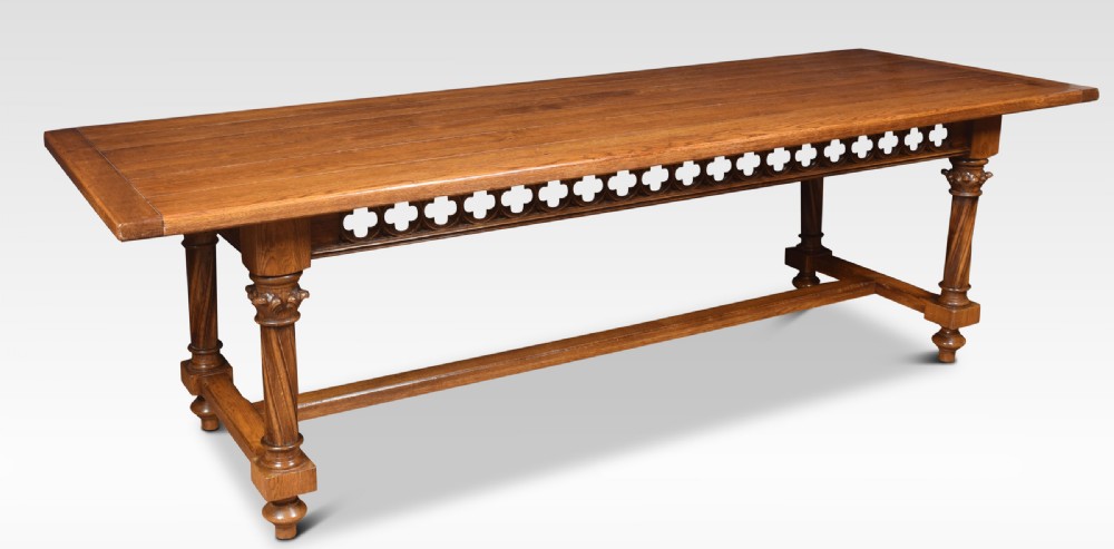 Gothic design oak refectory table and eight chairs View VIII