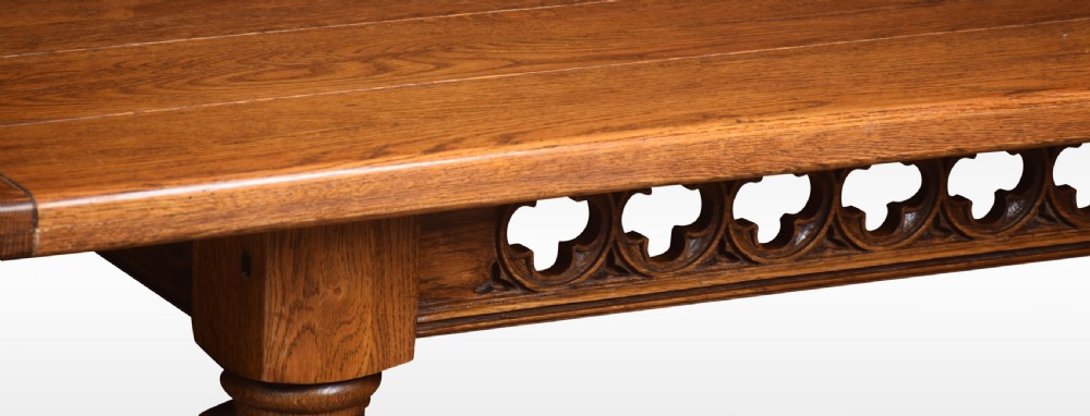 Gothic design oak refectory table and eight chairs View XI