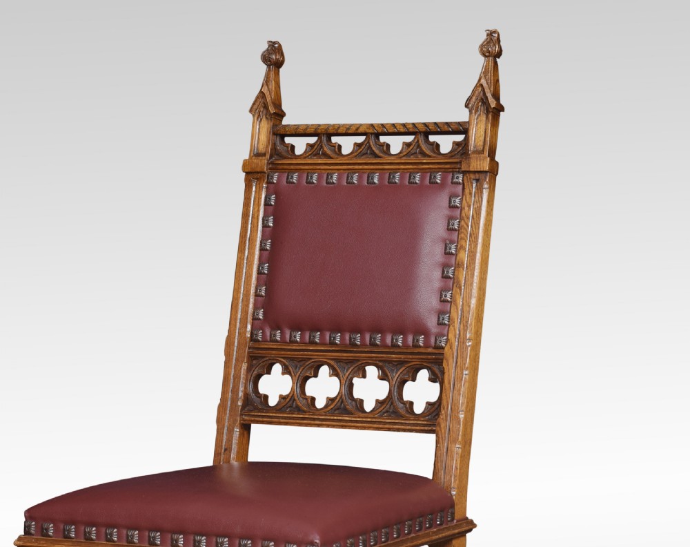 Gothic design oak refectory table and eight chairs View XII