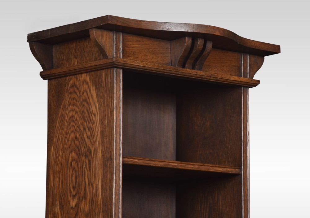 Pair of Arts and Crafts oak narrow open bookcases View III