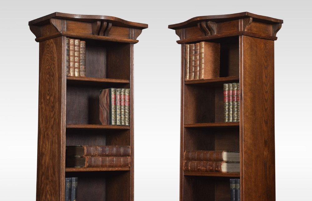 Pair of Arts and Crafts oak narrow open bookcases View IV