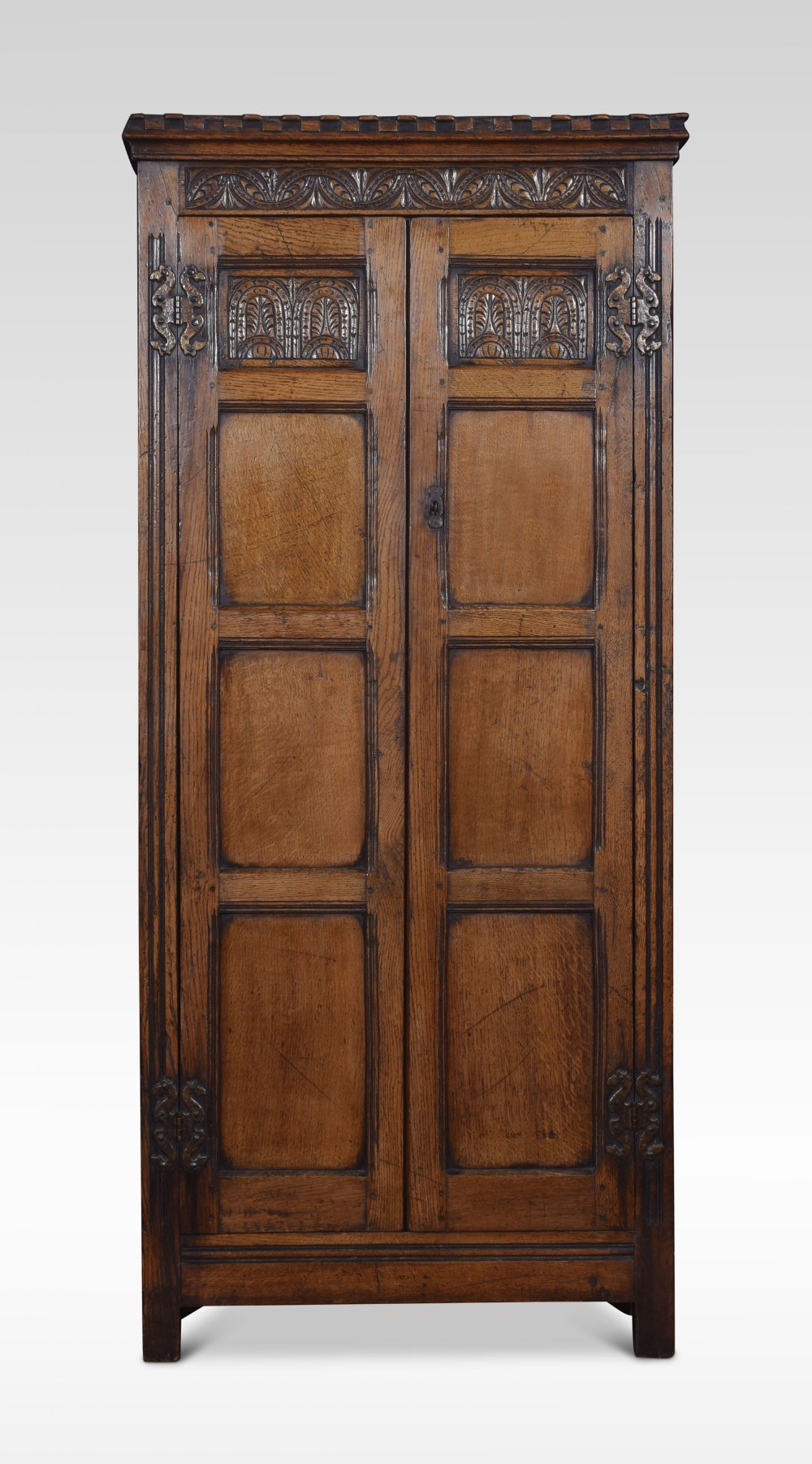 Carved oak cupboard