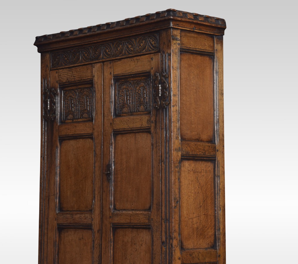 Carved oak cupboard View III