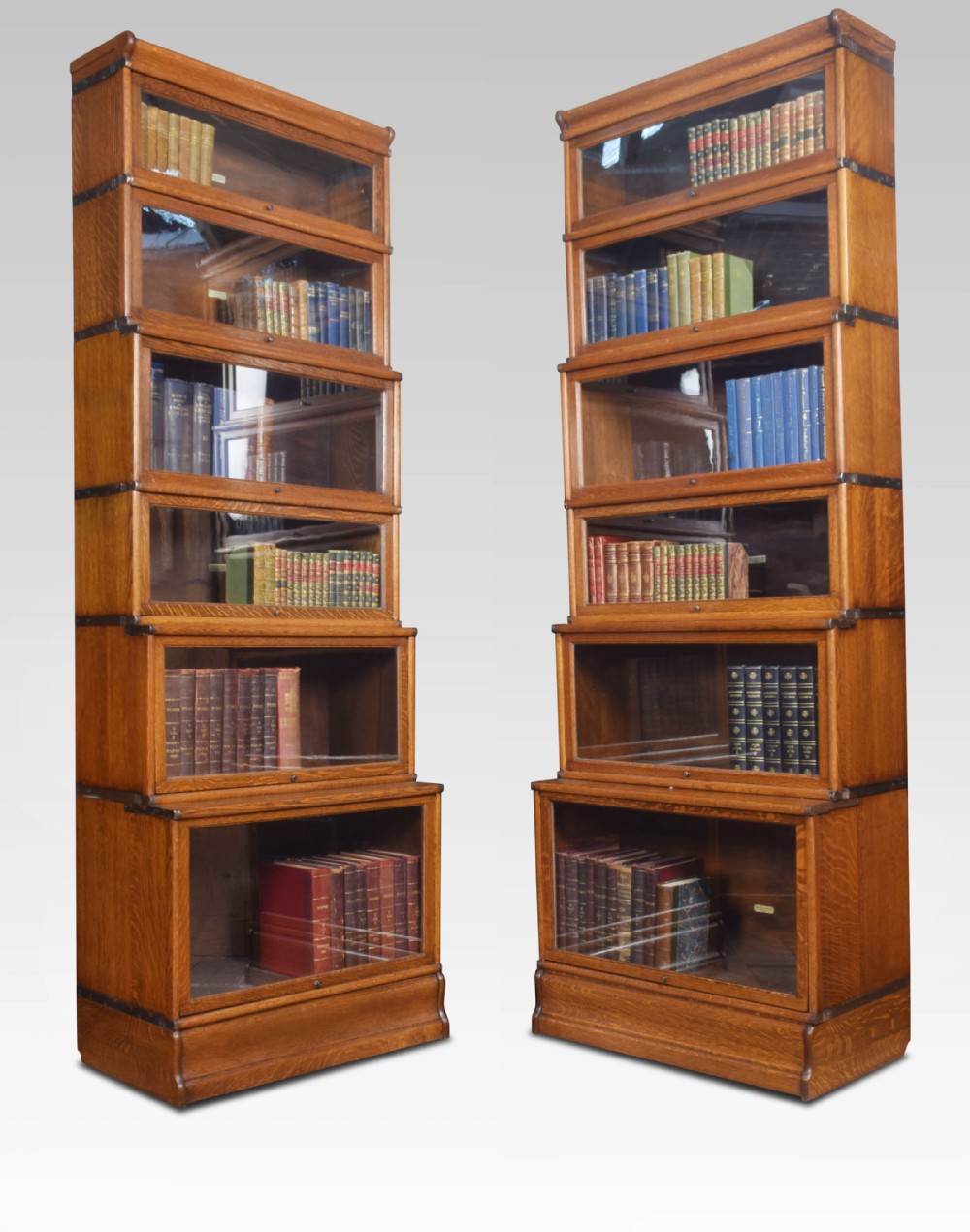 Pair Oak globe Wernicke six section bookcases