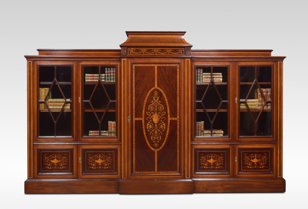Sheraton revival mahogany inlaid breakfront bookcase