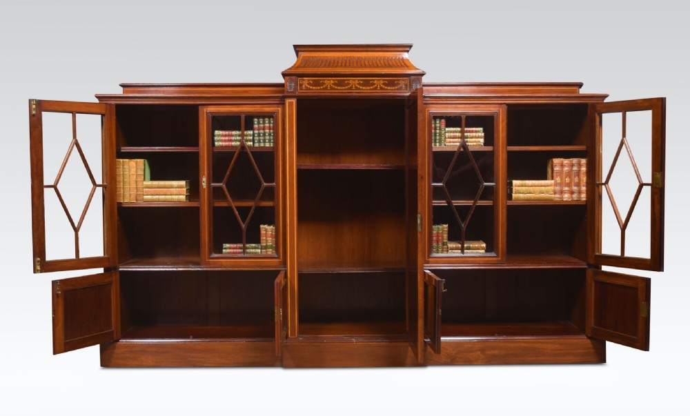 Sheraton revival mahogany inlaid breakfront bookcase View III