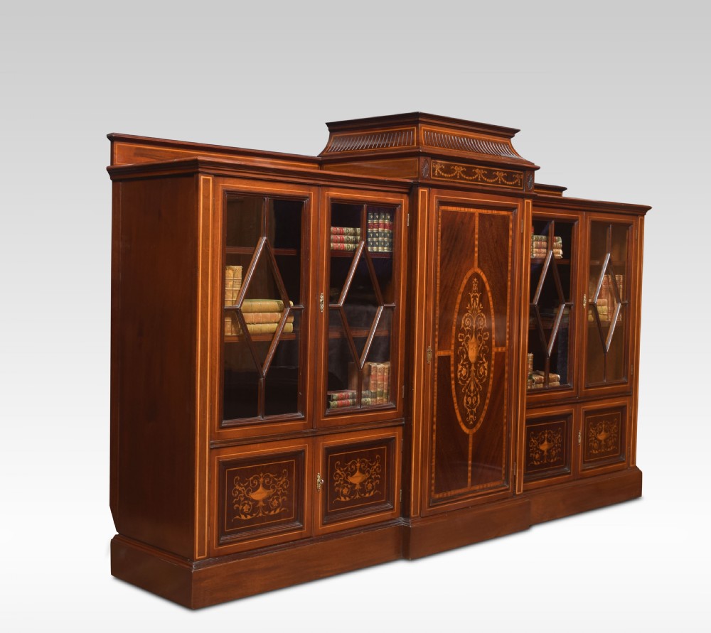 Sheraton revival mahogany inlaid breakfront bookcase View IV
