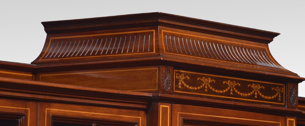 Sheraton revival mahogany inlaid breakfront bookcase View VIII