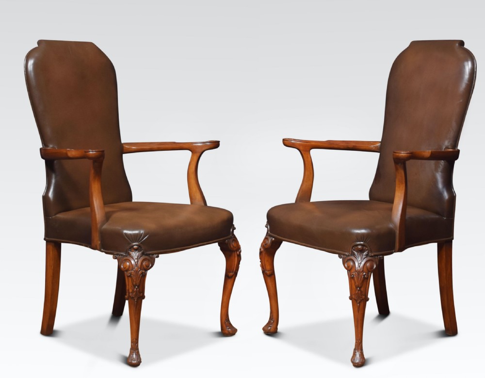 Set of eight high back brown leather upholstered dining chairs View II