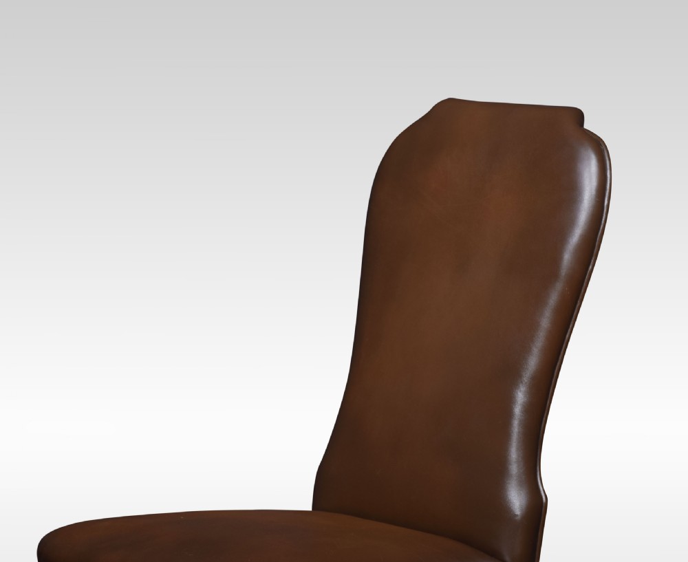 Set of eight high back brown leather upholstered dining chairs View VII