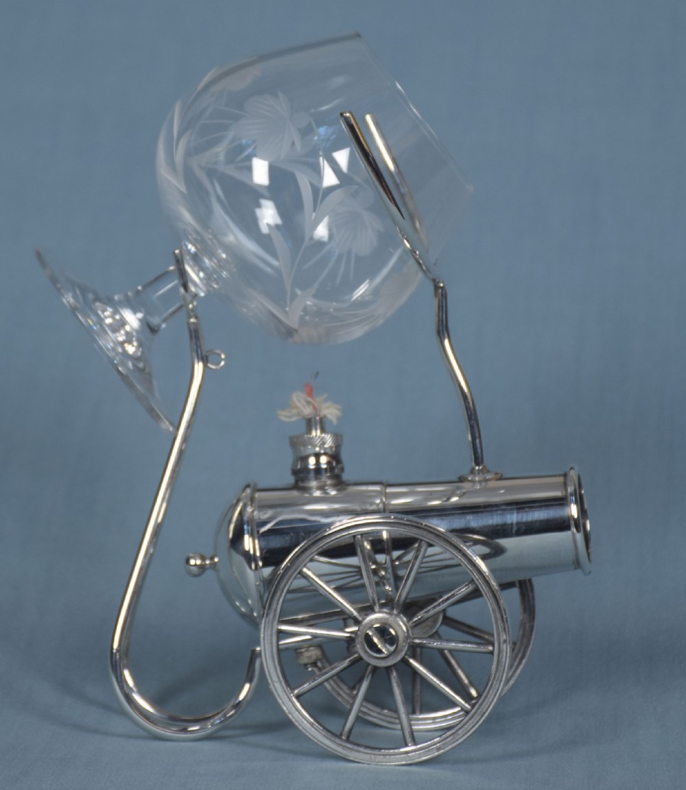 A silver plated brandy warmer