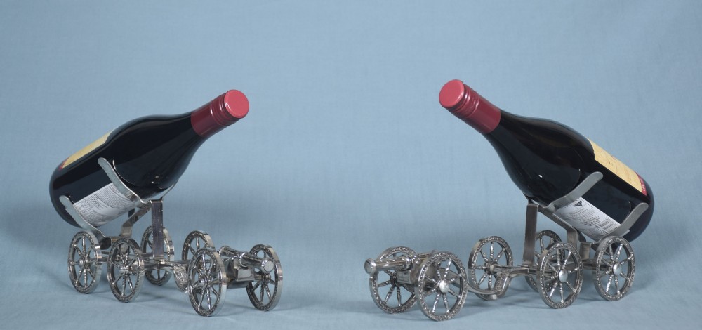 Pair of silver plated bottle stands