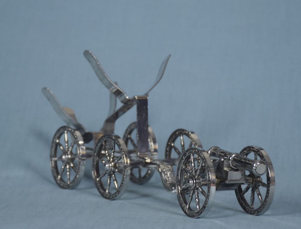 Pair of silver plated bottle stands View V