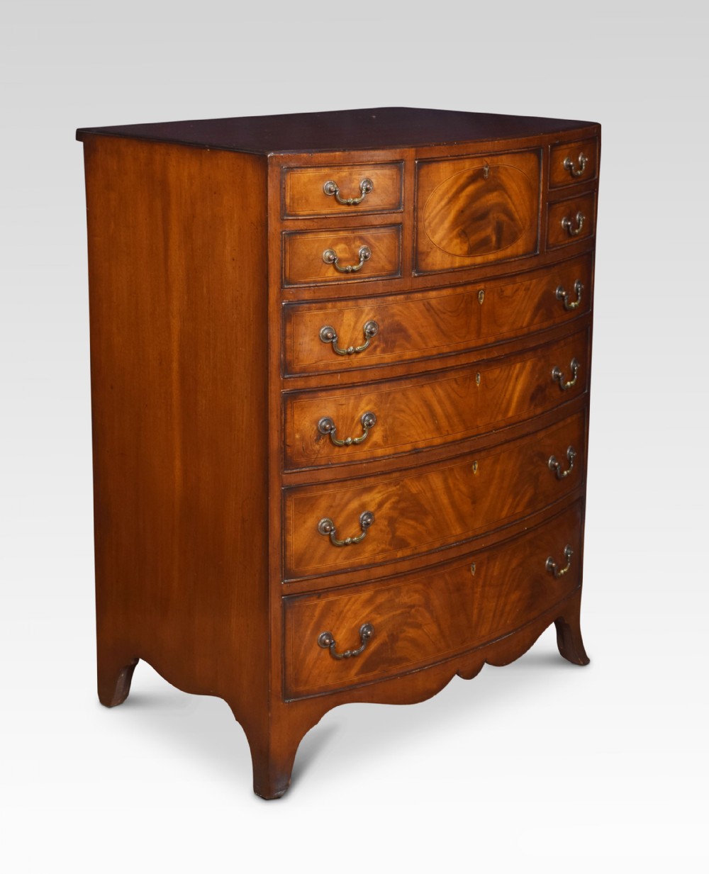 Regency style mahogany bow fronted chest of drawers