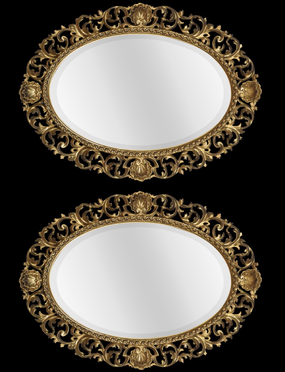 Pair of oval Florentine gilt wall mirrors