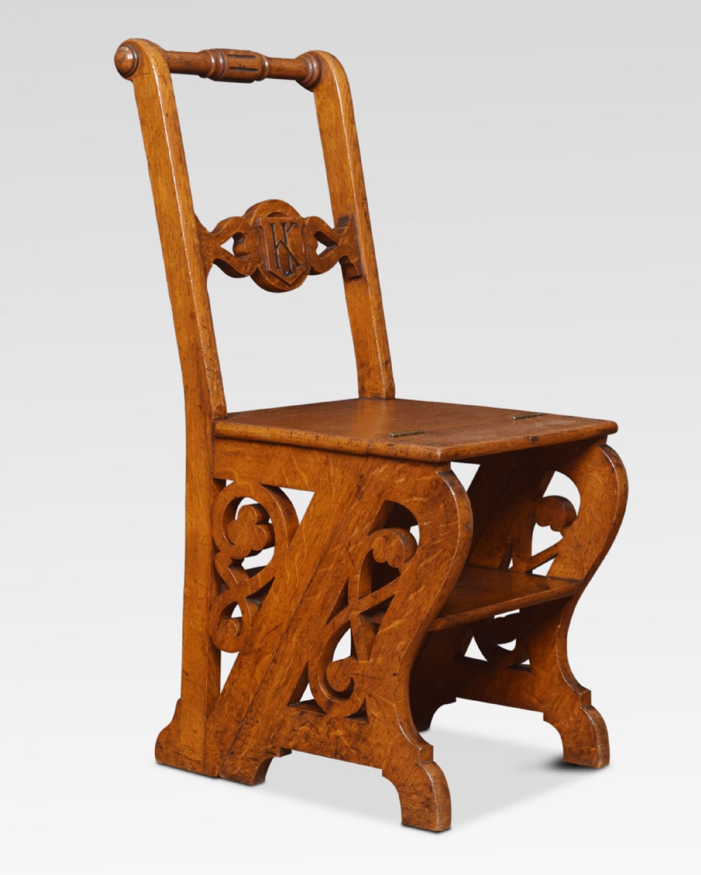 Oak metamorphic library chair
