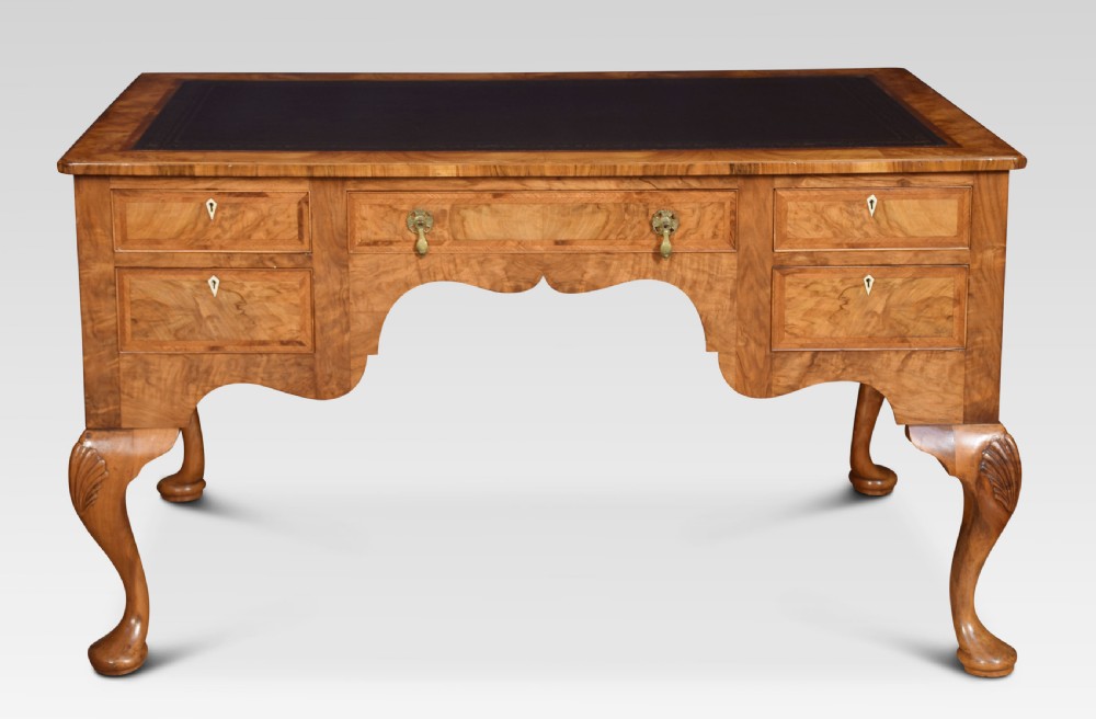 Walnut writing desk of Queen Ann design