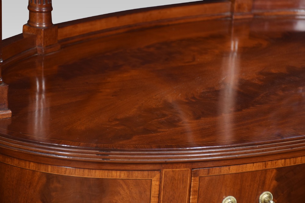 Mahogany inlaid oval dressing table View VII