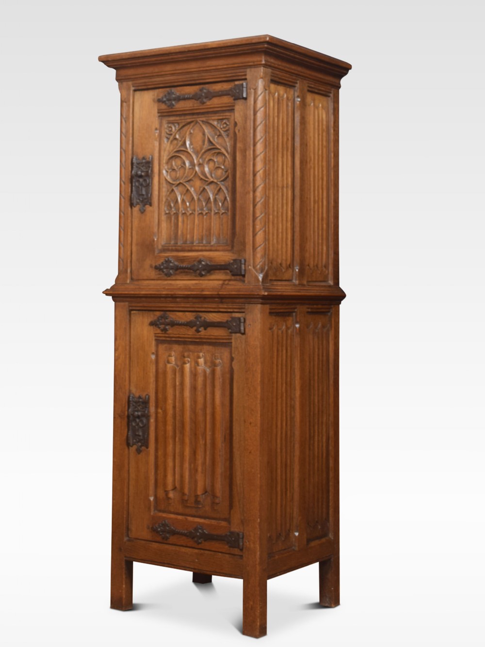 Carved oak cupboard of small proportions