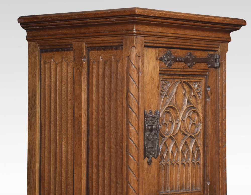 Carved oak cupboard of small proportions View V