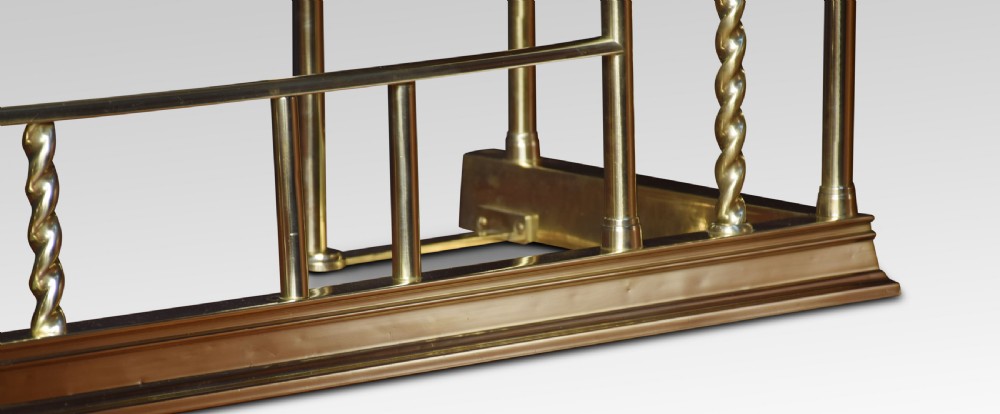 Edwardian brass and leather upholstered club fender View II