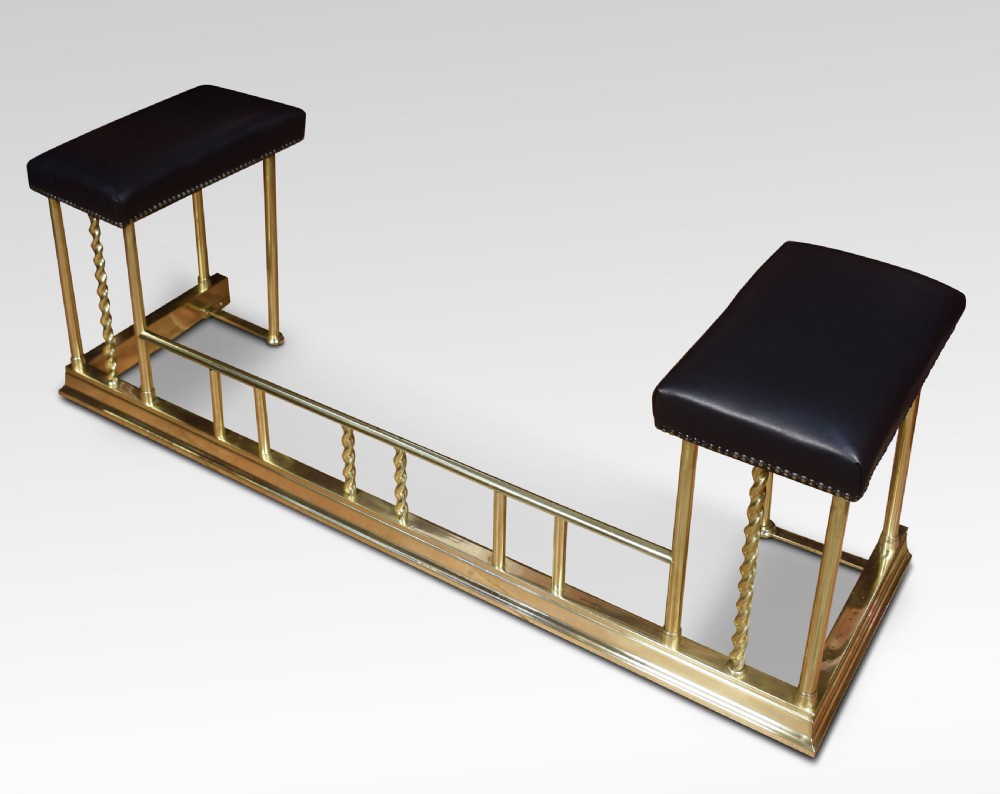 Edwardian brass and leather upholstered club fender View IV