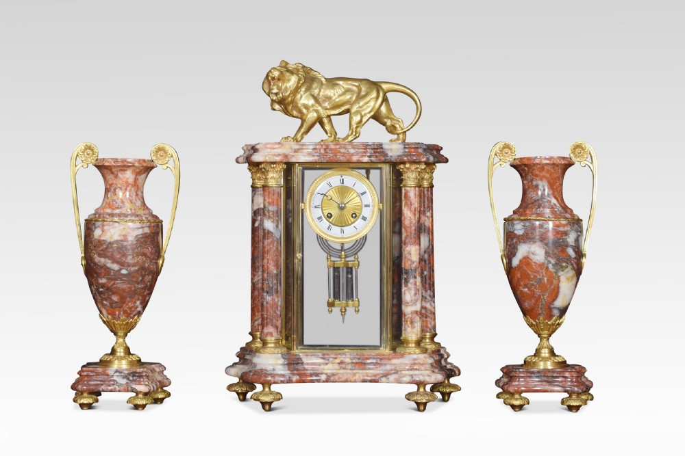 Late 19th century French rouge marble four glass clock set