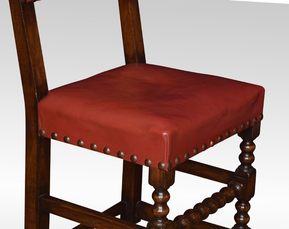 Set of fourteen leather uppolstered substantial oak dining chairs View IX