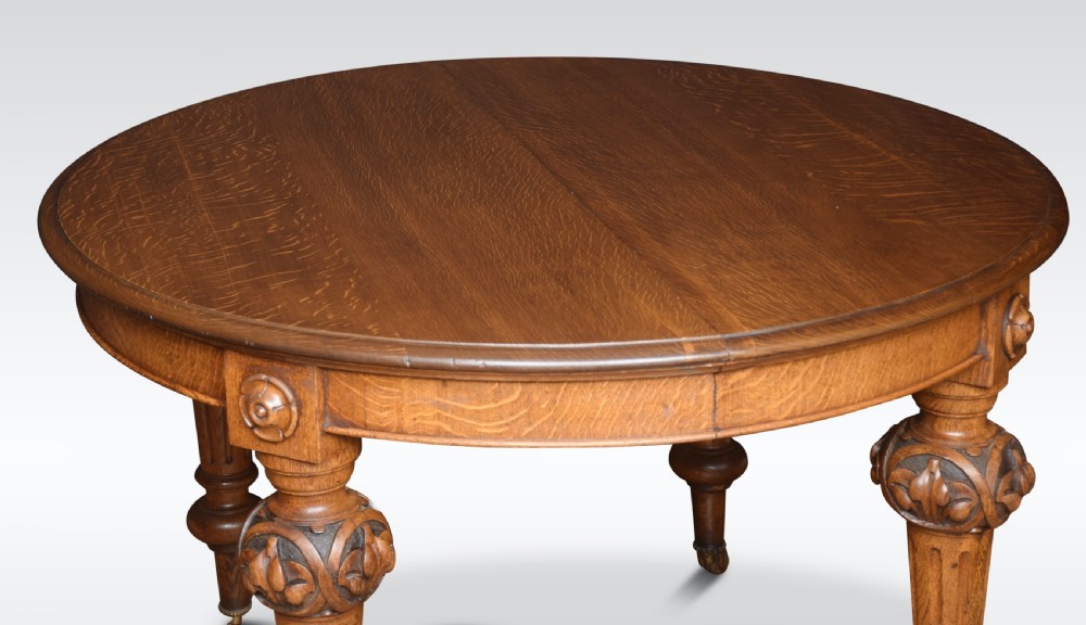 Oak oval extending dining table View V