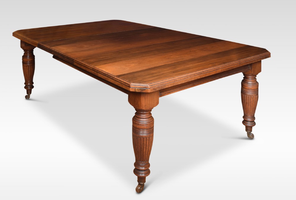 Walnut extending dining table