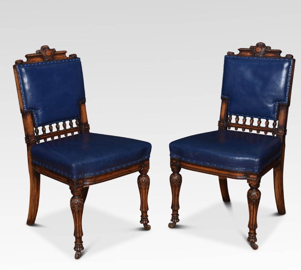 Pair of leather upholstered office chairs