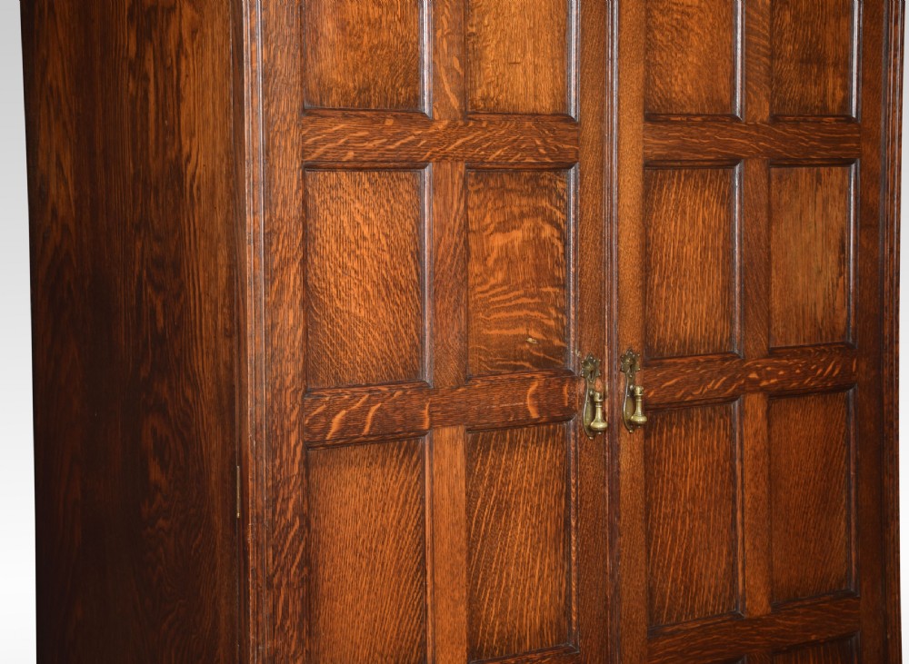 Carved oak two door compactum wardrobe View IV