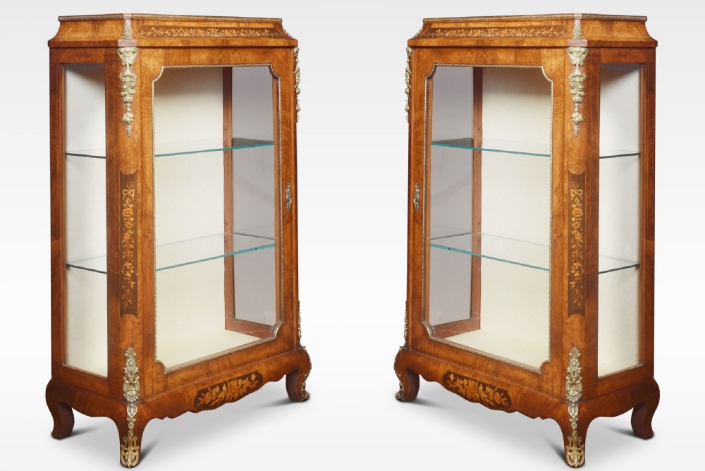 Pair of figured walnut inlaid pier cabinets
