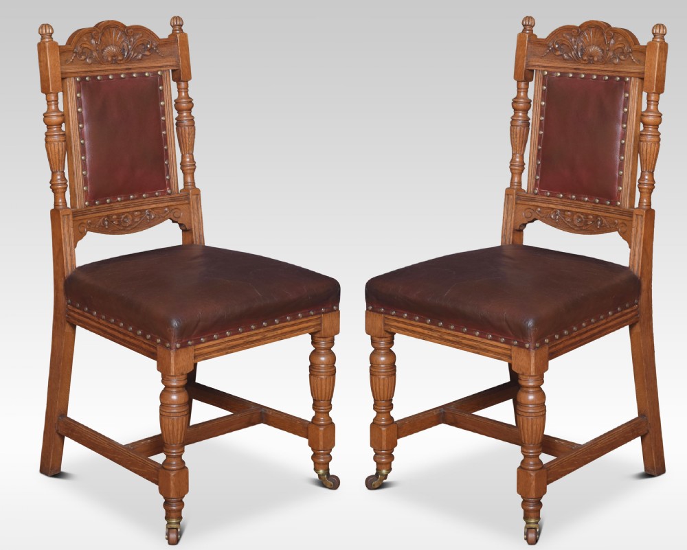 Set of Ten oak dining chairs View II