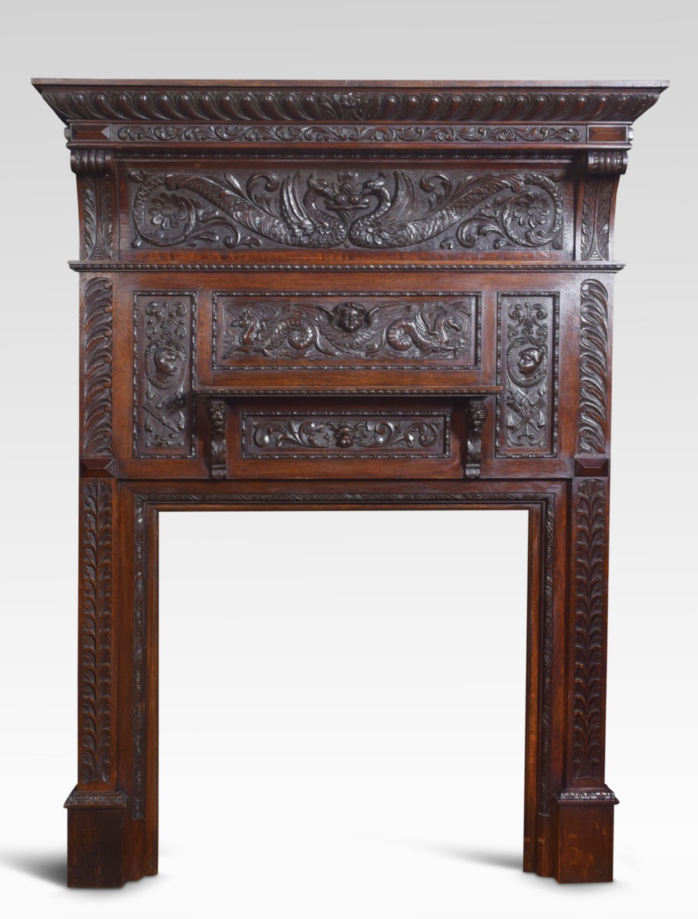 Carved oak fire surround