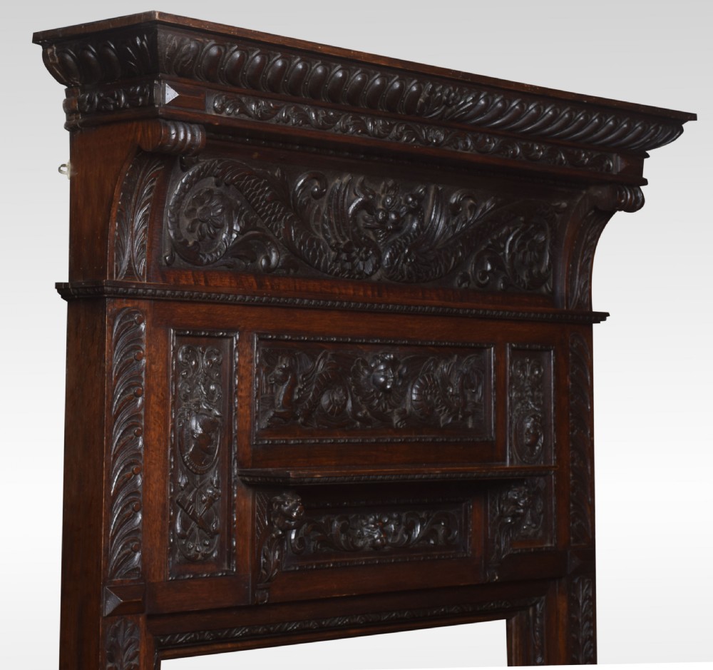 Carved oak fire surround View III