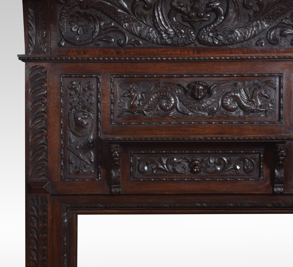 Carved oak fire surround View VII