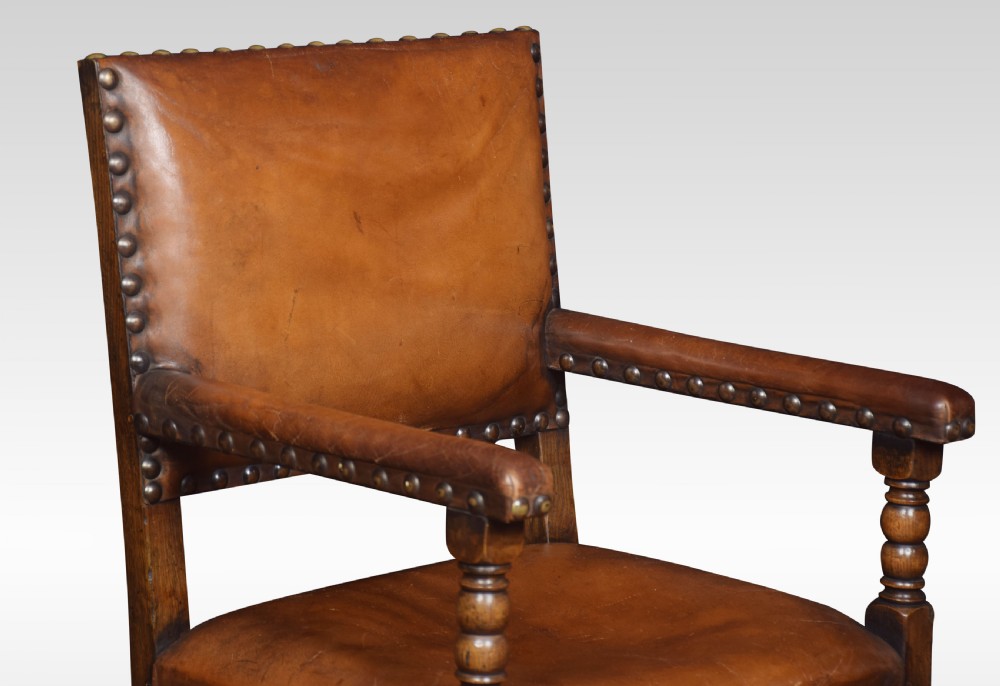 Eight leather upholstered oak dining chairs View III