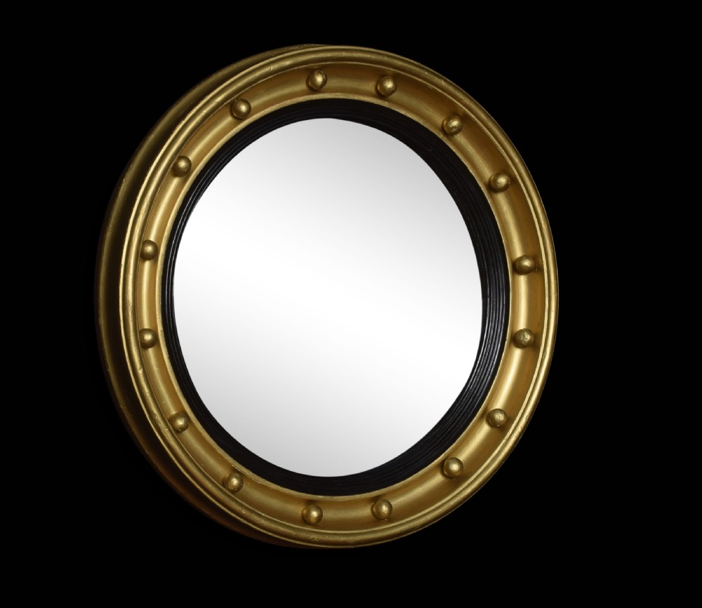 Giltwood and gesso circular convex mirror View III