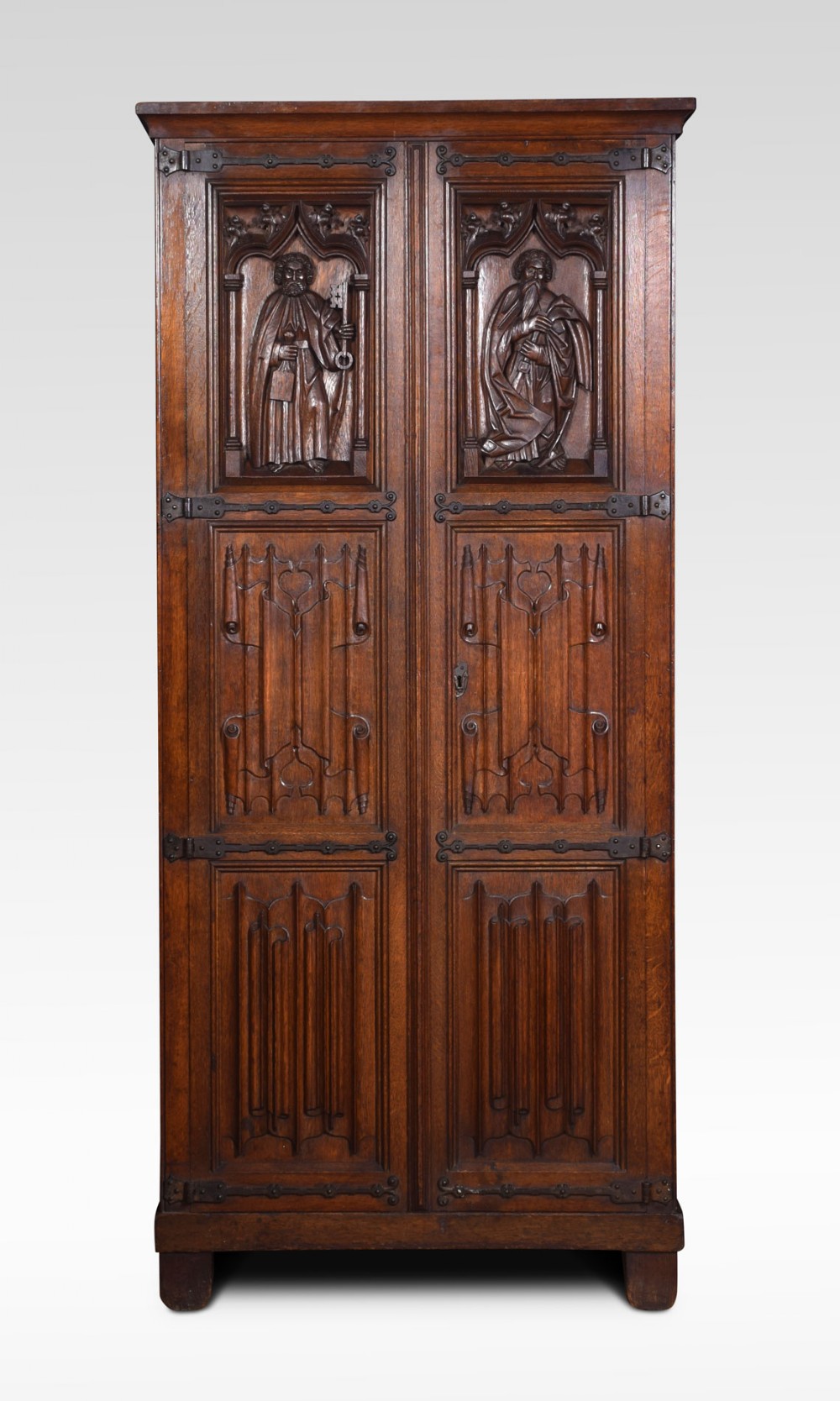 Gothic oak two door cupboard